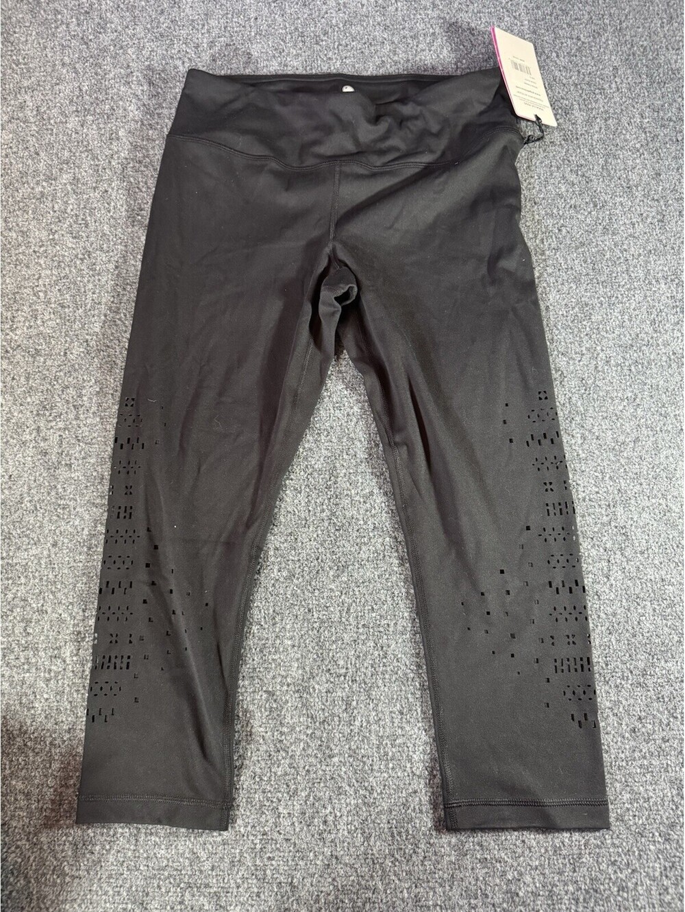 Yogalicious Sz Large Capri w/perforated Design on Leg Black. NEW $78